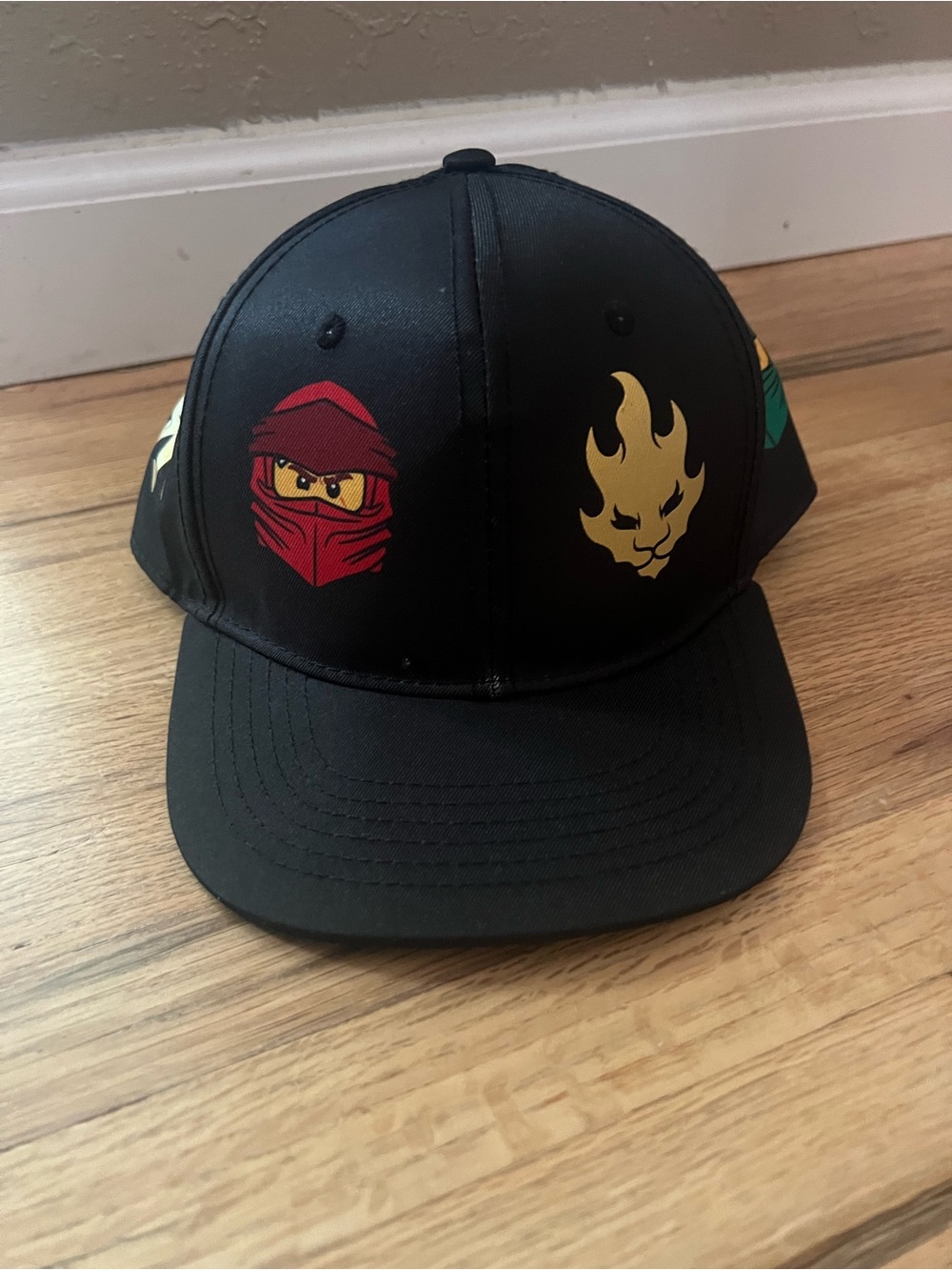 Kids Black Lego Ninjago Ninja Cap with Red and Gold Graphics